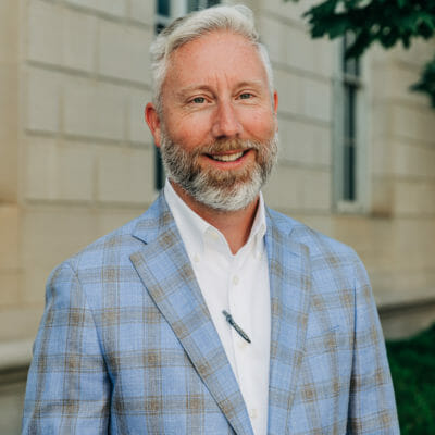 Headshot image of John M. Stone